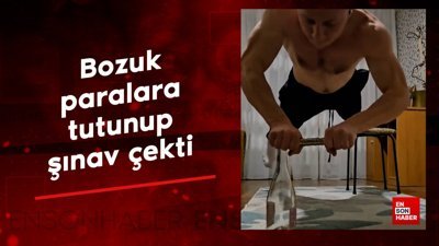 Bozuk paralara tutunup şınav denemesi yaptı