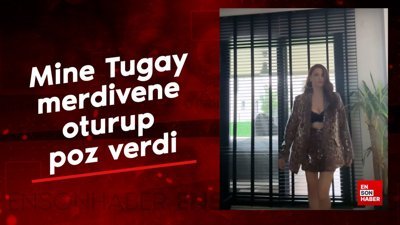 Oyuncu Mine Tugay merdivene oturup poz verdi