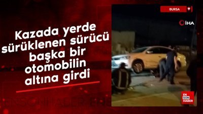 Bursa'da kazada yerde sürüklenen motosikletli otomobilin altına girdi