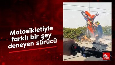 Motosikletiyle farklı bir şey deneyen sürücü