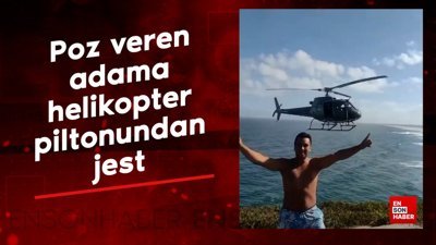 Poz veren adama helikopter pilotundan jest