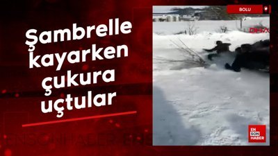 Bolu'da şambrelle kayarken çukura uçtular