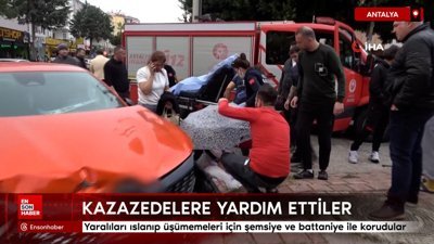 Antalya'da yaralıları şemsiye ve battaniye ile korudular