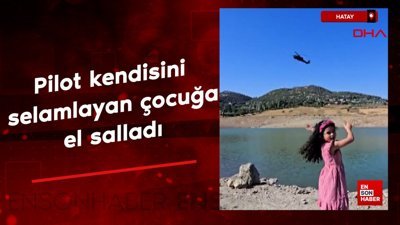 Hatay'da askeri helikopterin pilotu kendisini selamlayan çocuğa el salladı