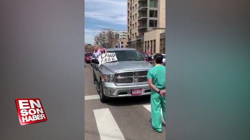 ABD'de karantina protestolarına sağlıkçılar engel olmaya çalışıyor