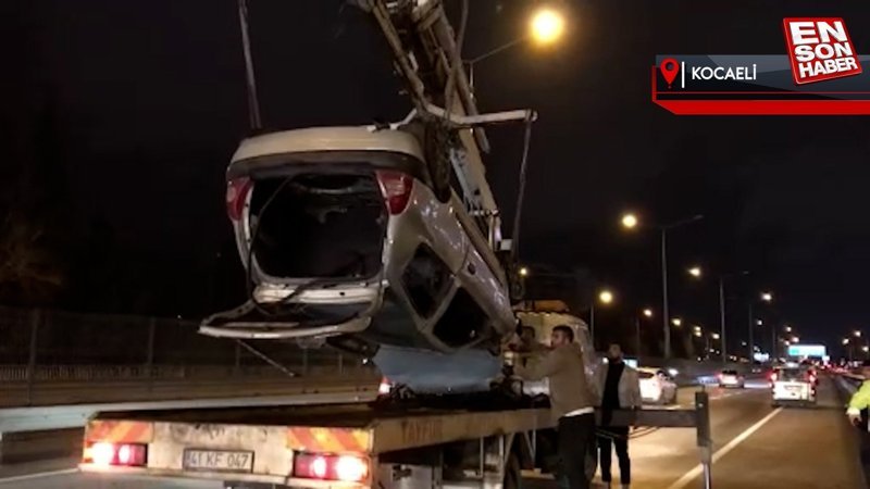 Kocaeli'de tırın lastiğine çarpan otomobil takla attı