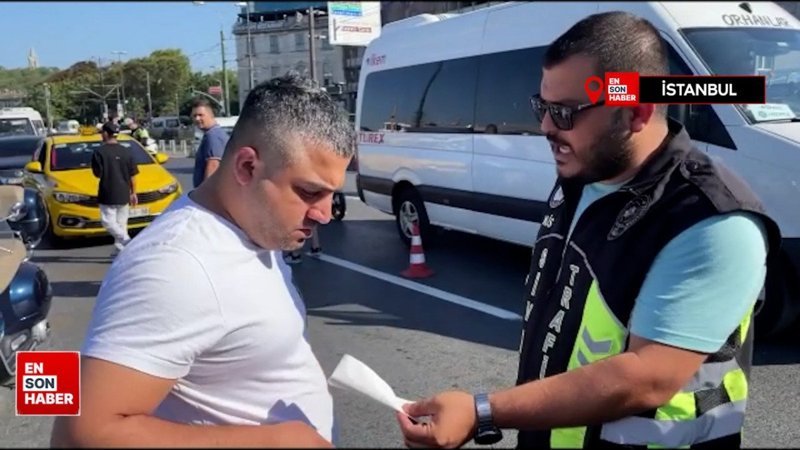 Fatih'te polisi yanıltmaya çalışan taksici, eza makbuzunu yere attı