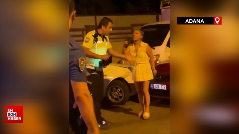 Adana'da çevirmeye takılan kadın, polis ekiplerini tehdit etti