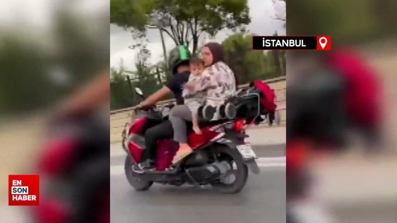 İstanbul'da tehlikeli yolculuk! Kucağında bebeğiyle motosiklete bindi