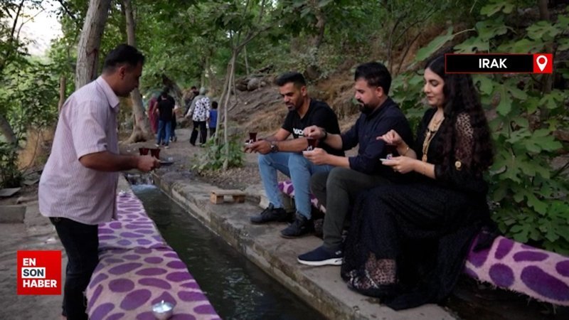 Irak ile İran'ı ayıran su kanalında çay keyfi