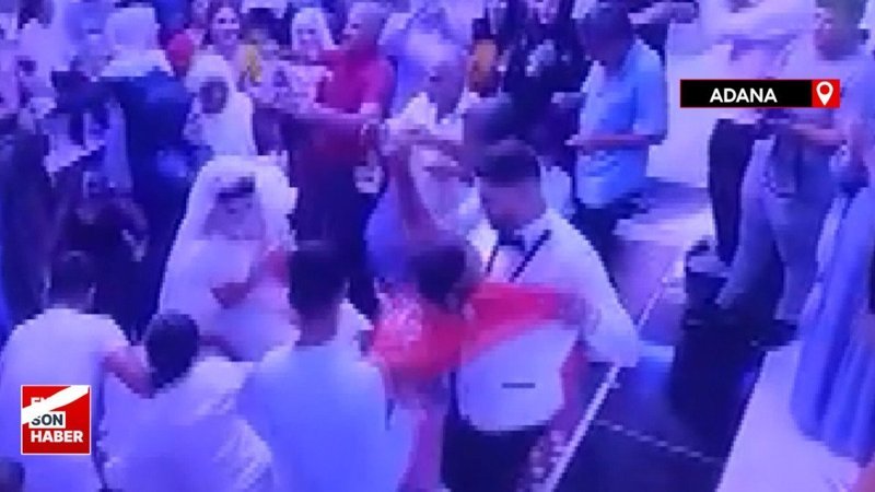 Damat, para takılı gelinliği çekiştiren çocuğu fırlatıp yere attı