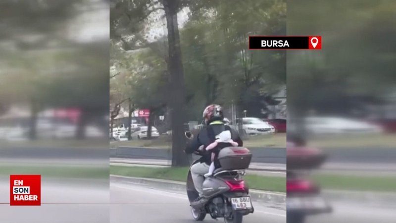 Bursa’da motosikletlinin sırtında bebeğiyle yolculuğu