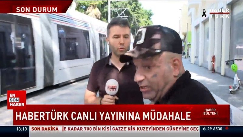 Mehmet Akif Ersoy'a Tel Aviv'de canlı yayın yaptığı sırada müdahale edildi