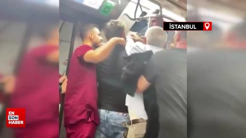 Metroda tükürük kavgası kamerada