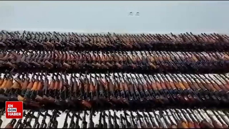 Kuzey Irak'ta nokta operasyon: Yüzlerce silah ve mühimmat ele geçirildi