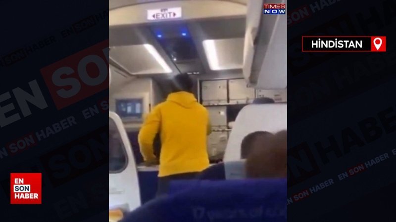 Hindistan'da uçuştaki gecikmeyi anons eden pilota yumruklu saldırı