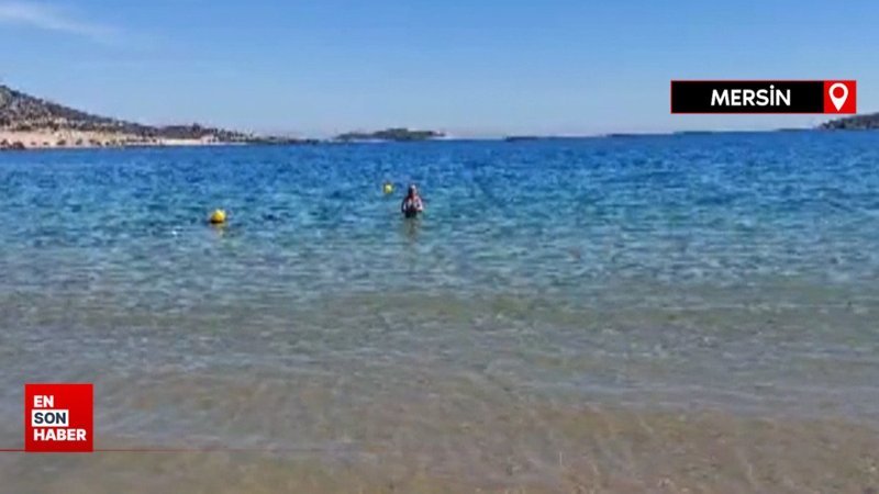 Mersin'in bir tarafında denize giriliyor, diğer tarafında karla mücadele