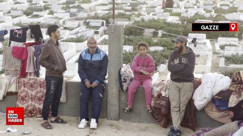 İsrail bombardımanından kaçan Gazzeli aileler mezarlıkta yaşıyor