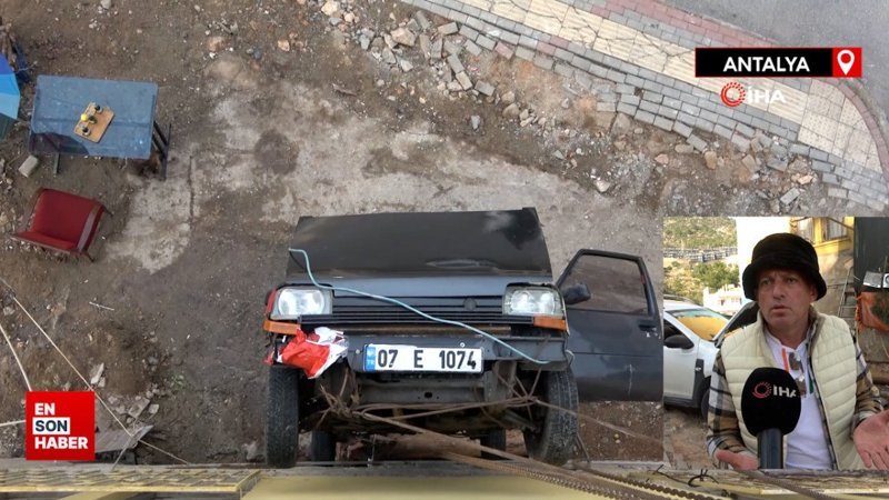 Antalya'da sürekli kazaya karışan otomobilini binaya astı