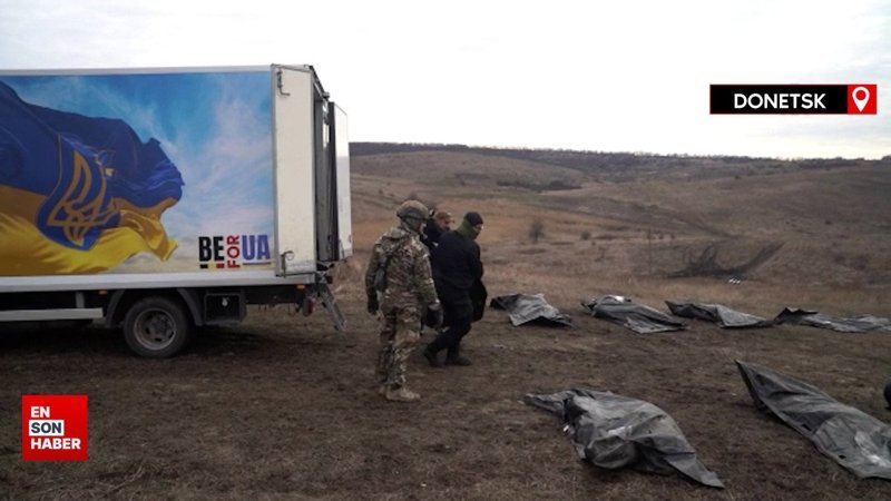 Ukraynalı gönüllüler, Rus askerlerinin cenazelerini topluyor