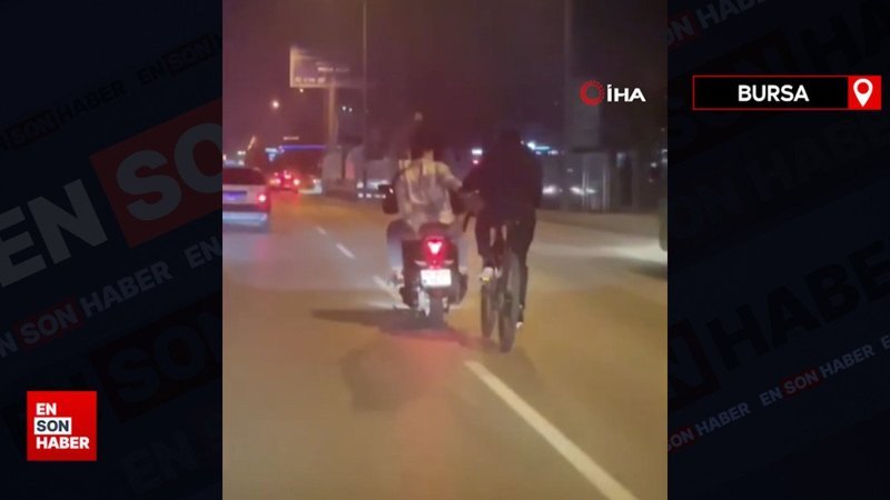 Bursa'da motosiklet ile bisikleti çekti