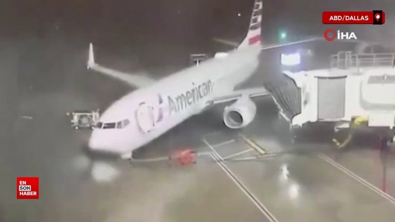 ABD'de etkili olan fırtına park halindeki yolcu uçağını döndürdü