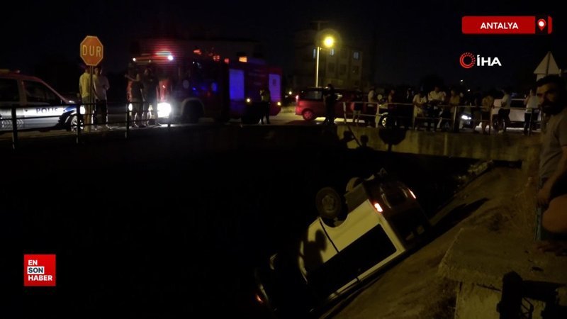 Antalya'da bariyerleri aşarak kanala uçan araç ters döndü