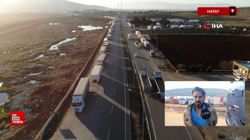 Suriye'ye geçmek için bekleyen tırlar uzun kuyruklar oluşturdu