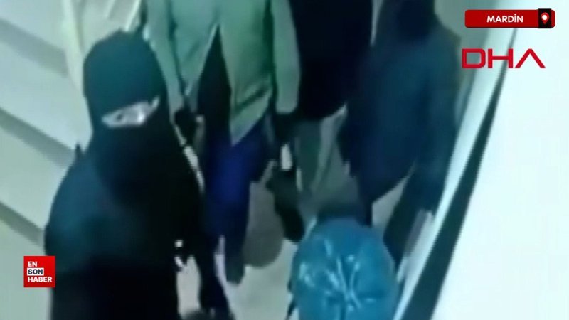 Mardin'de maskeli şüpheliler, husumetlilerinin kapısını parçaladı